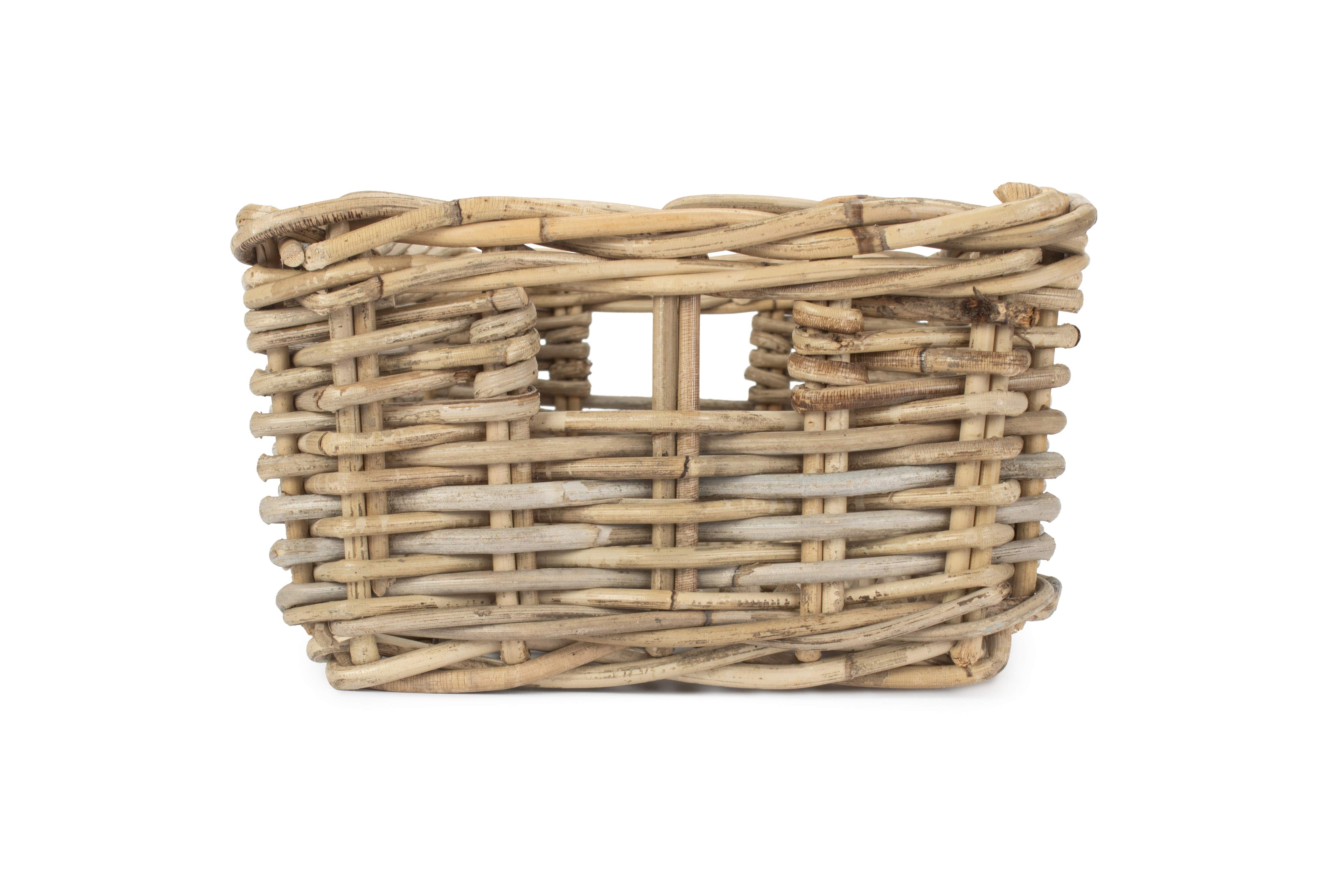 Close up of a long narrow shelf storage basket. Made from natural wicker.